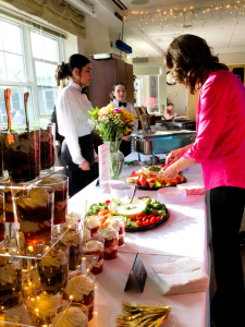 A Delicious Evening of Networking and Community Spirit vibrant spring décor and a delicious menu that included a mashed potato bar, chili bar, assorted desserts
