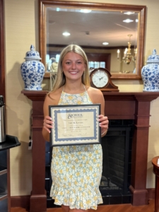 Lily Leroux – 2026 Eugene Oriol Memorial Community Scholarship Recipient Lily Leroux holds her certificate after receiving the 2026 Eugene Oriol Memorial Community Scholarship from the Oriol Foundation.